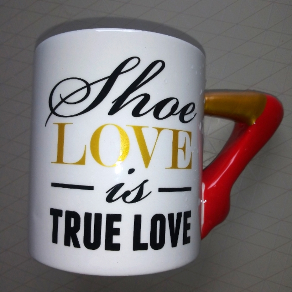 Pier 1 coffee cup "Shoe Love is True Love".  4"h. 3.5" diameter.